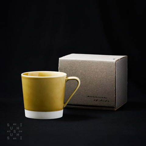 Sand Saikai Dip Glaze Mug and its box on Black Background